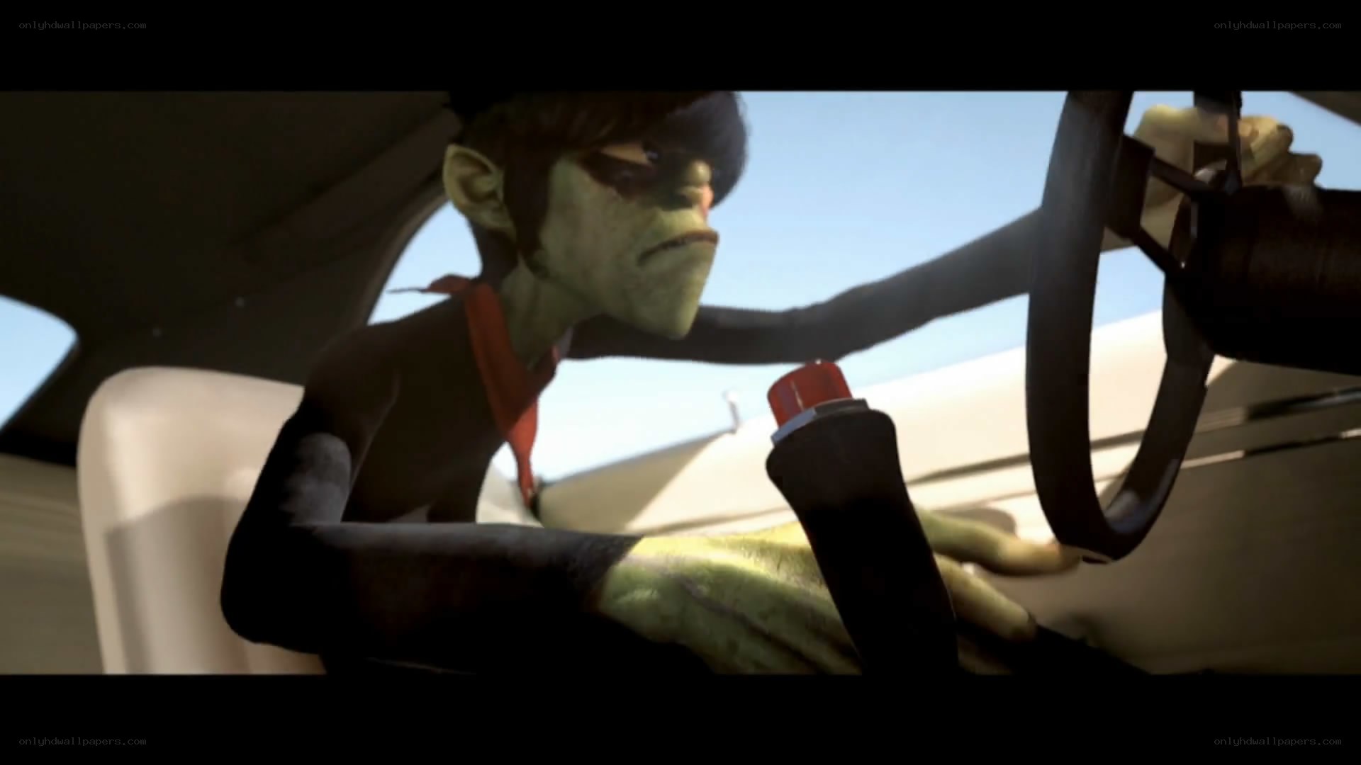 gorilla driving a car