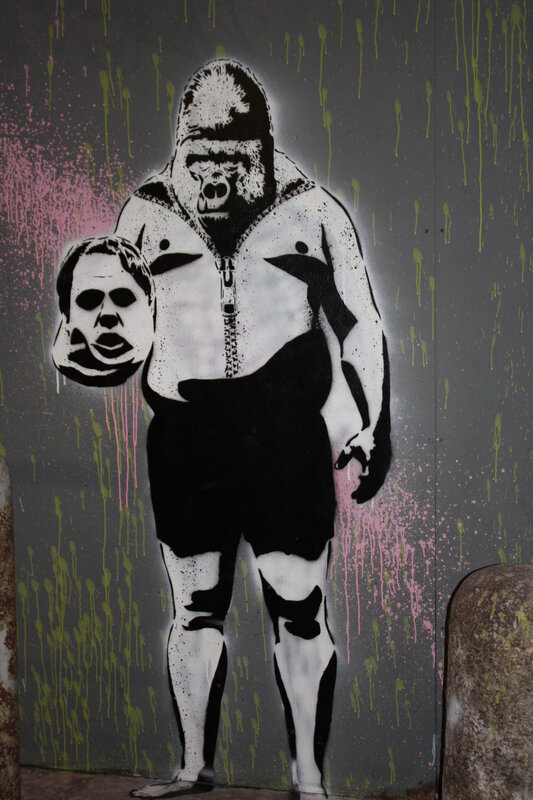 Gorilla holding a severed head