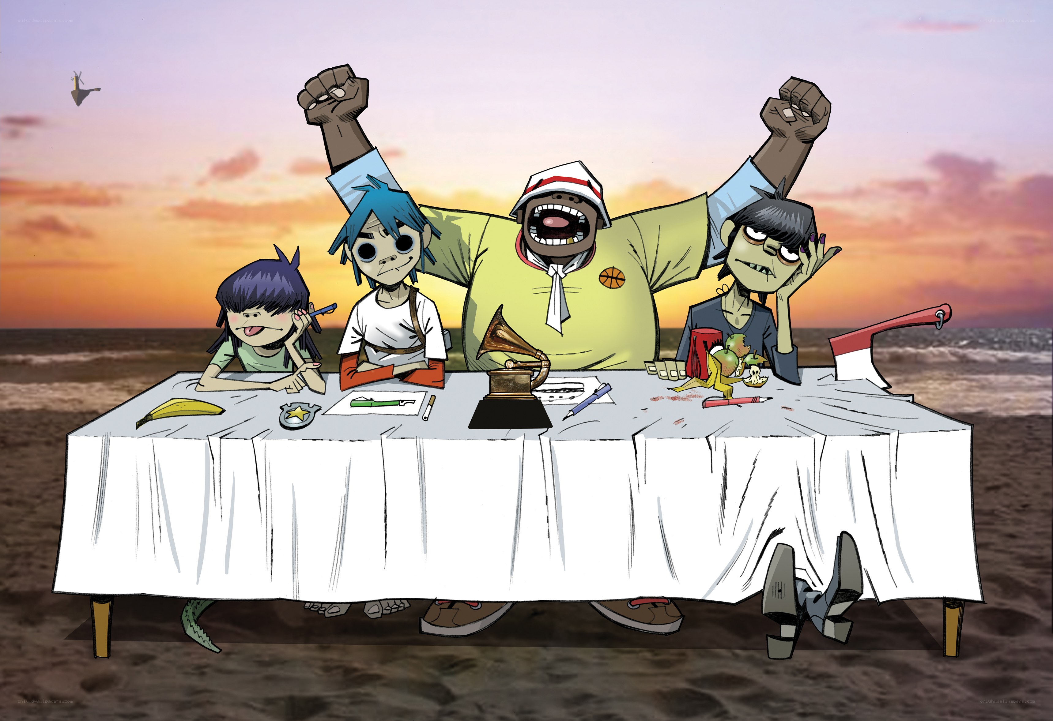 Gorillaz band at beach table