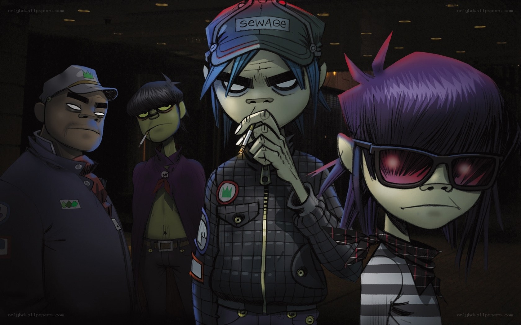 Gorillaz band members in dark setting