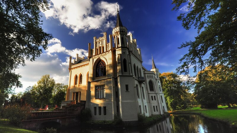 Gothic castle by a river