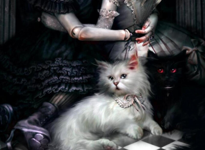 Gothic cats with a doll