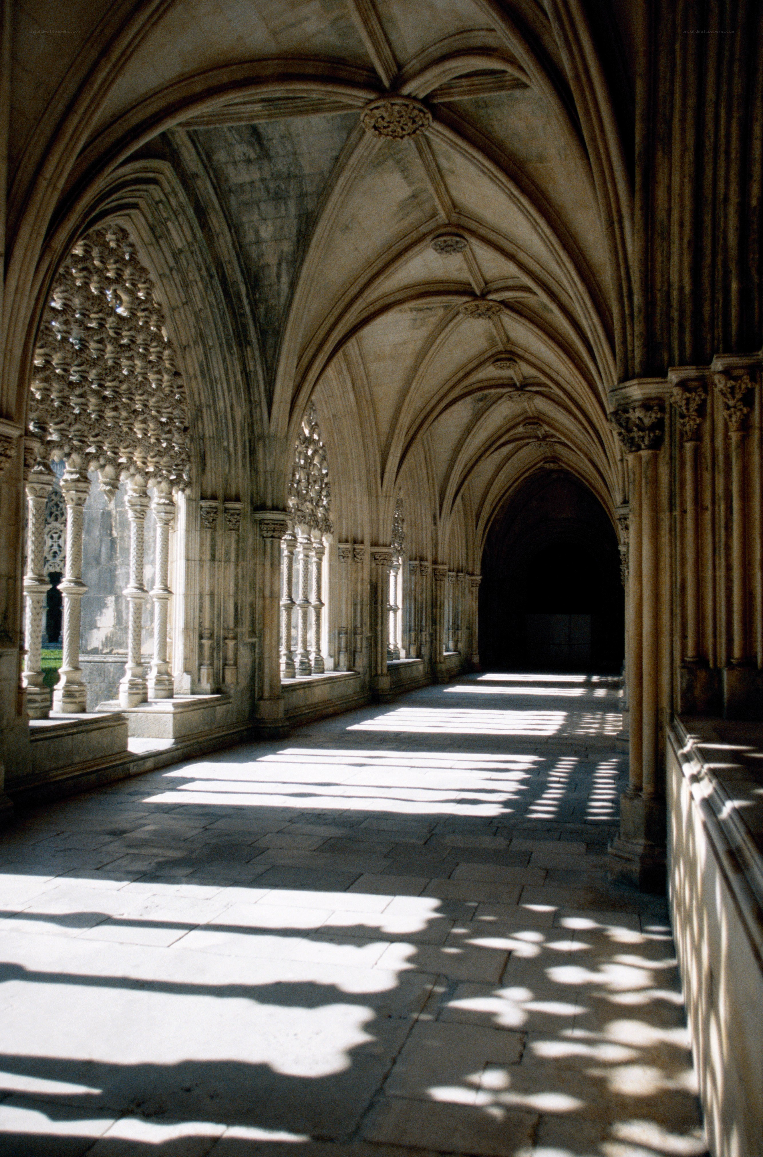 Gothic cloister with sunlight