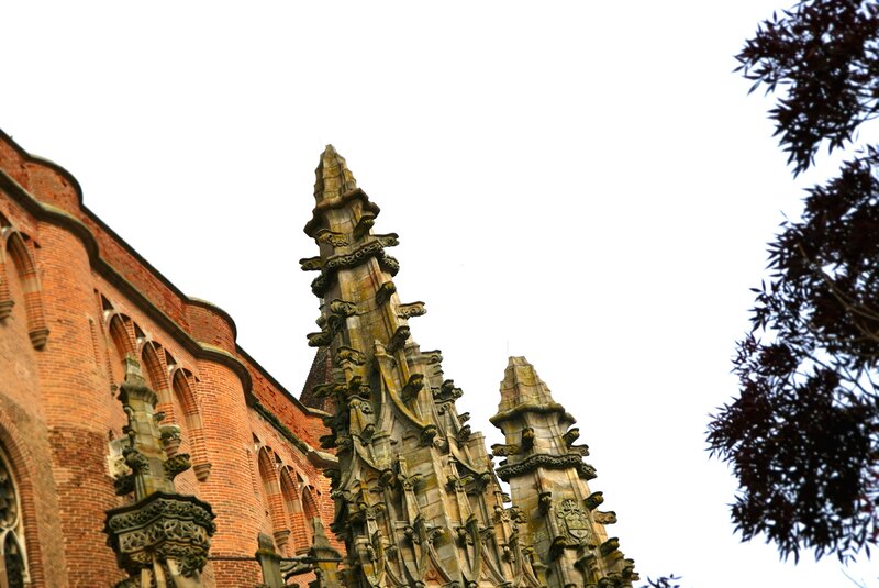 Gothic Spire and Brick Wall