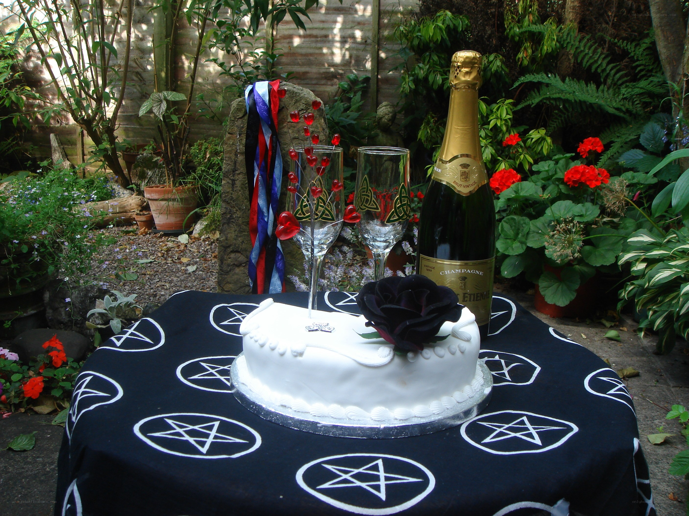 Gothic wedding cake in garden
