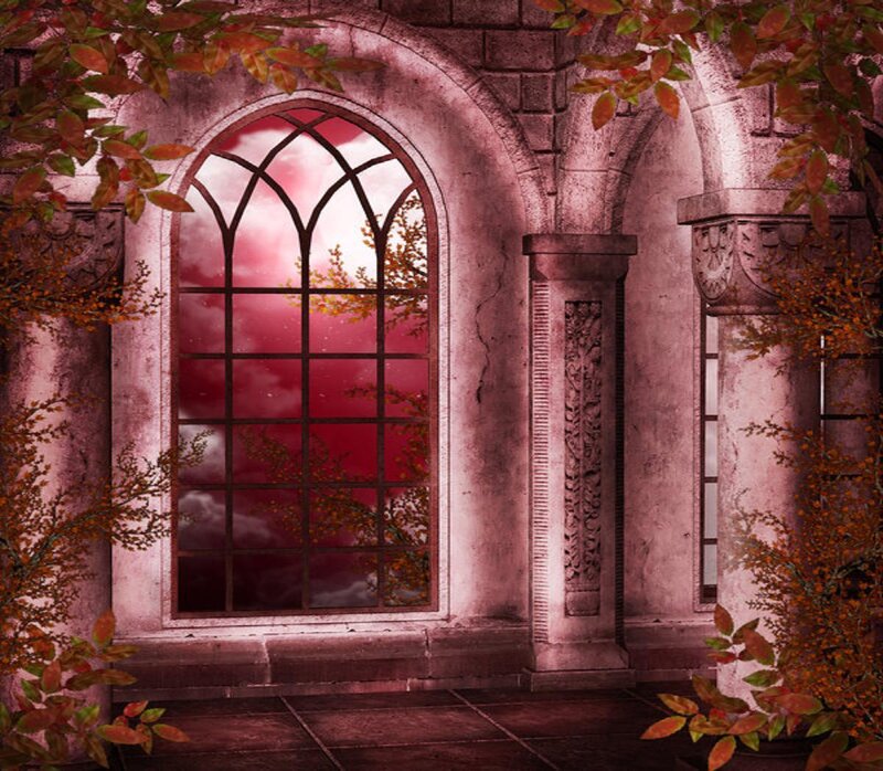 gothic window with autumn foliage