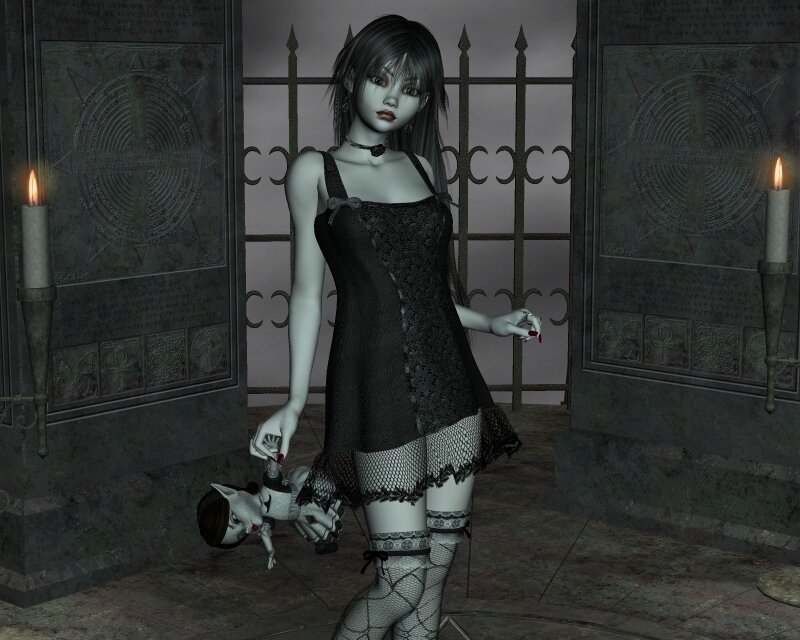 Gothic woman with doll