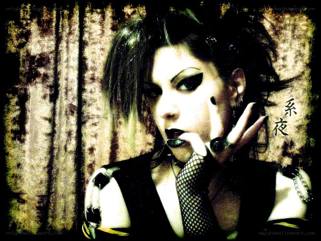 gothic woman with fishnet gloves