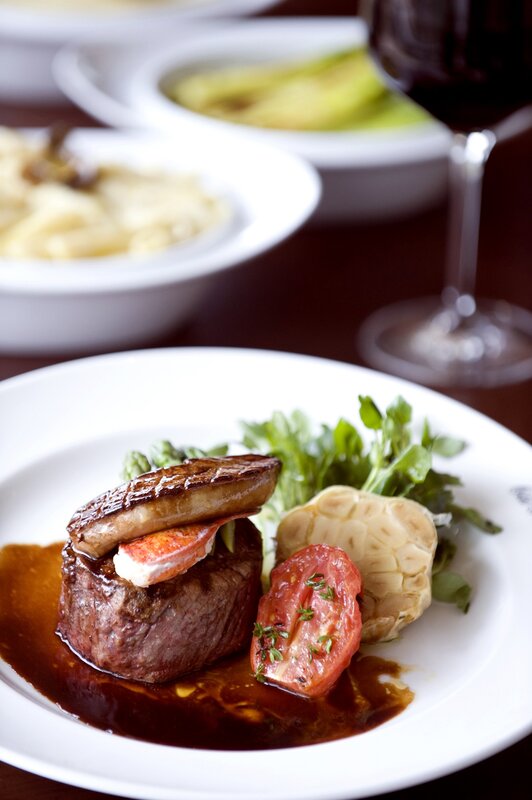 Gourmet steak with lobster and wine