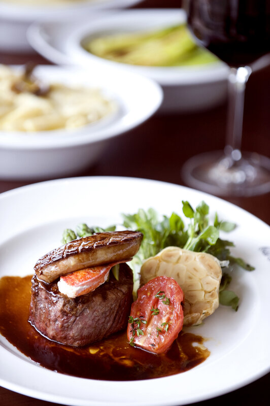 Gourmet steak with lobster and wine