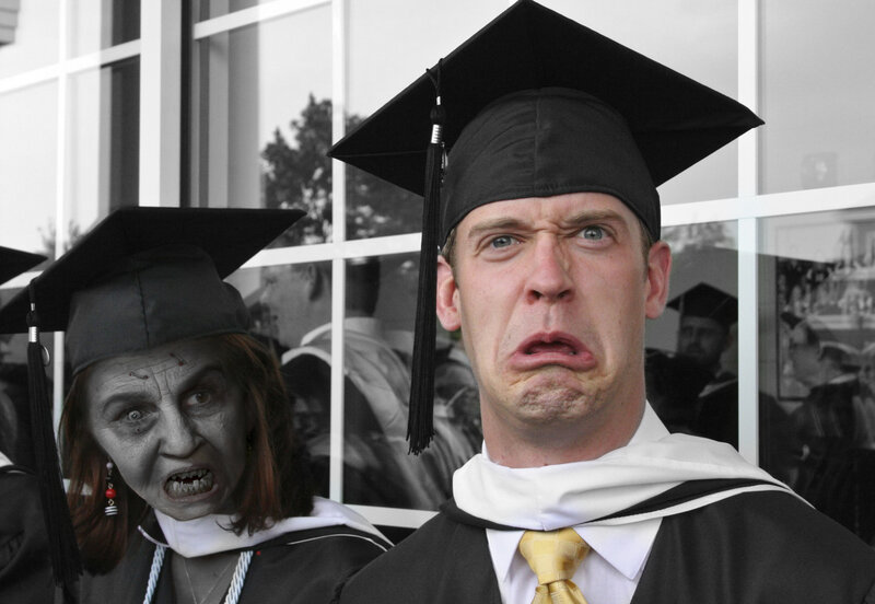 Graduates with zombie makeup