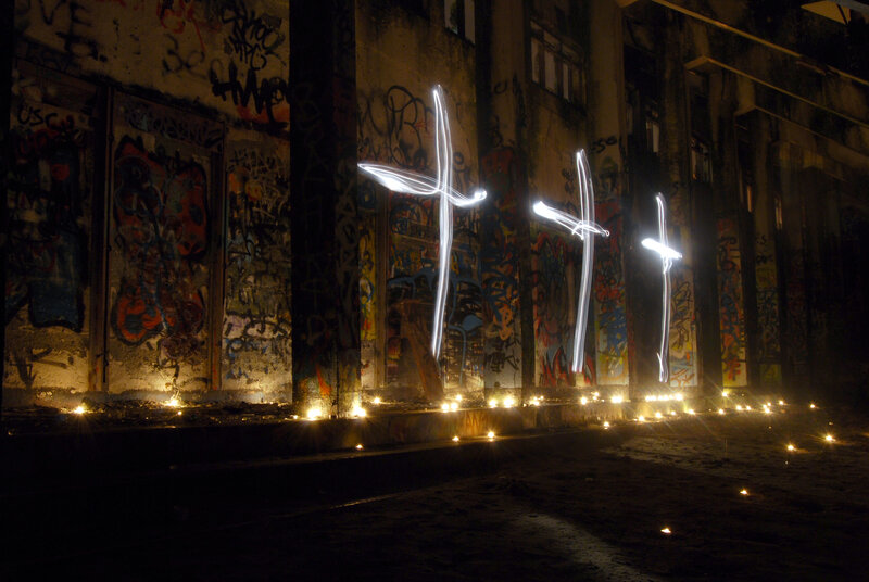 Graffiti alley with light crosses