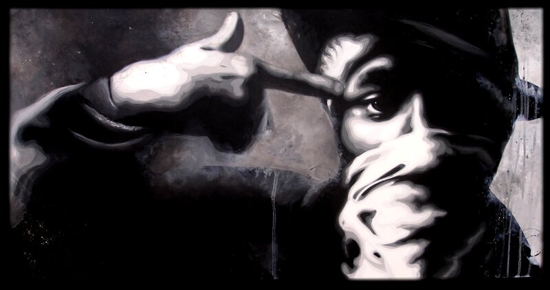 graffiti art of a man with gun