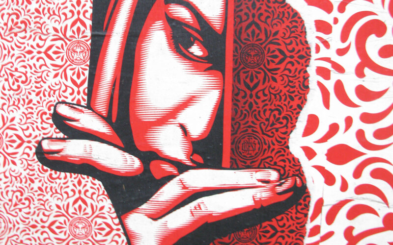 graffiti art of hand and face