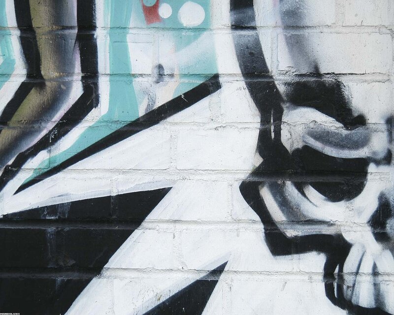 graffiti art on brick wall