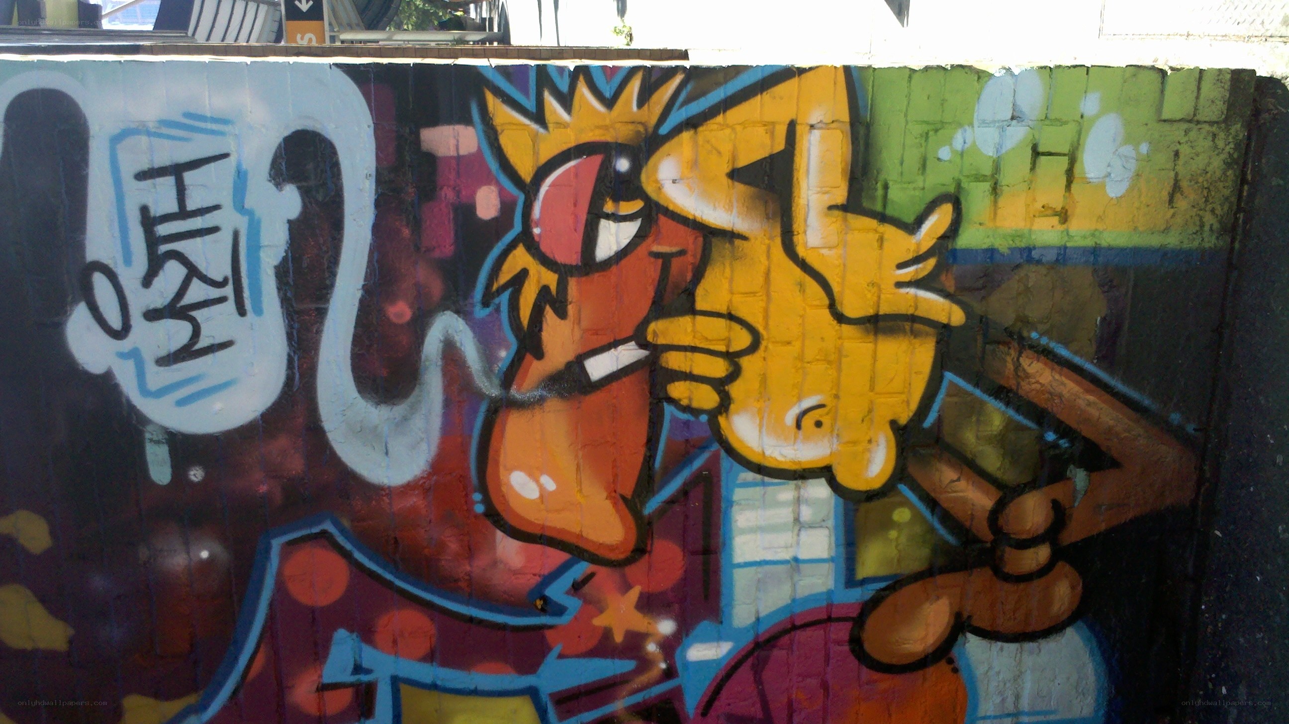 graffiti art on brick wall