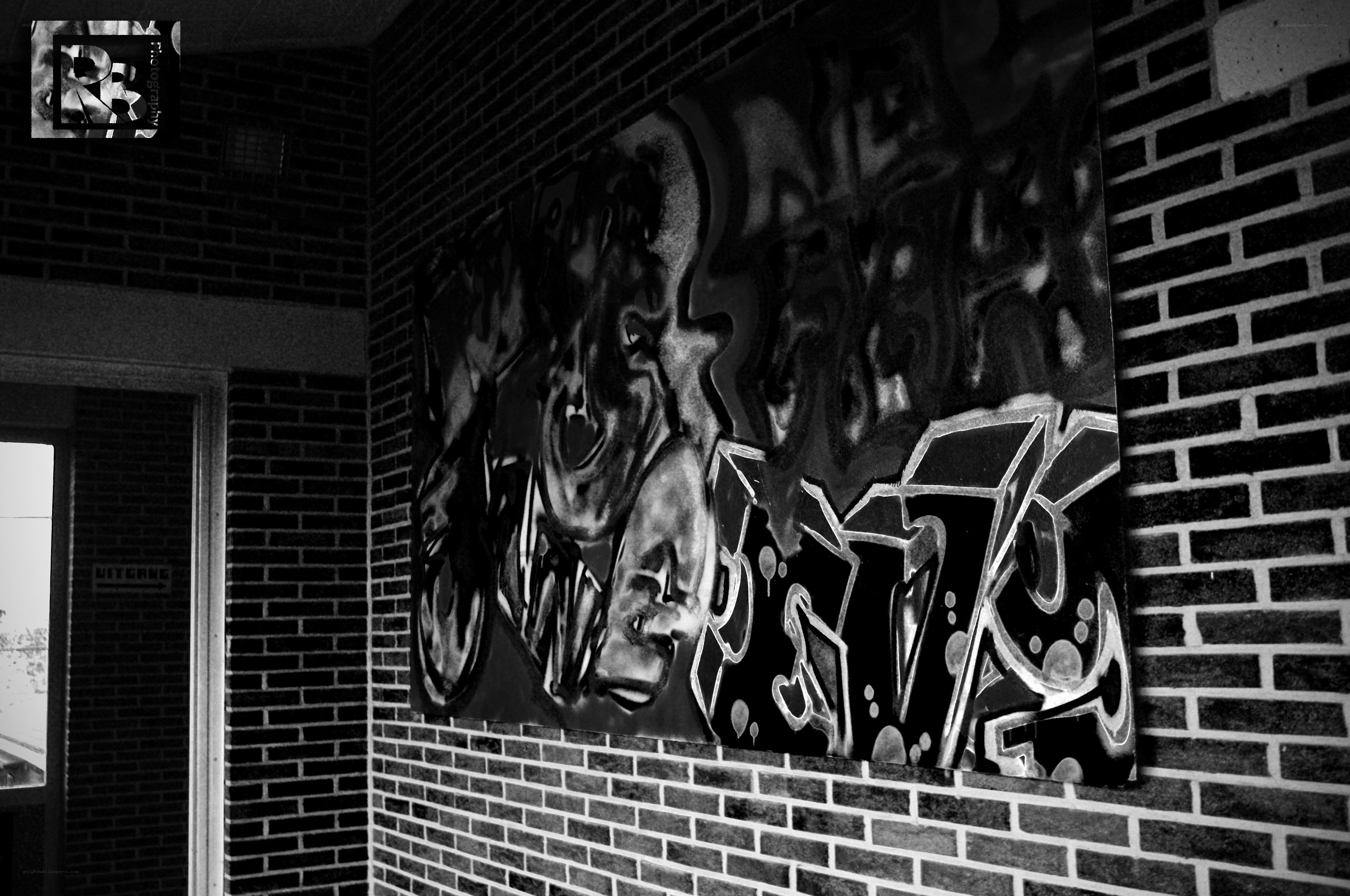 graffiti art on brick wall