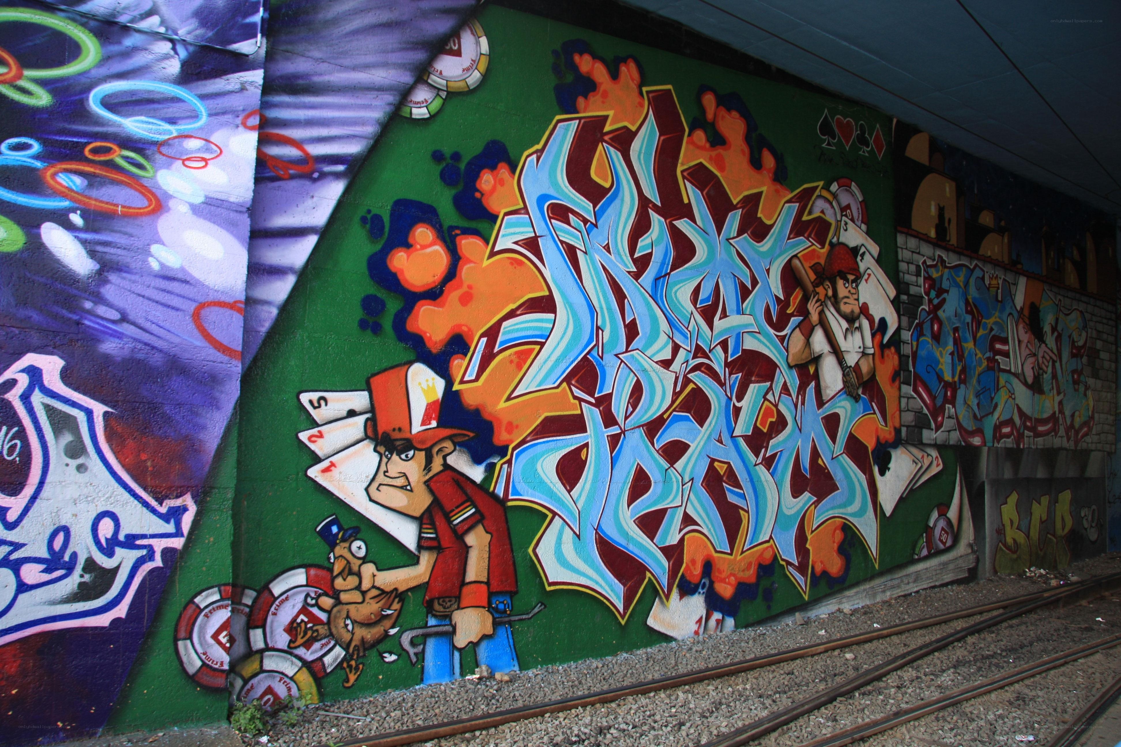 graffiti art under train tracks