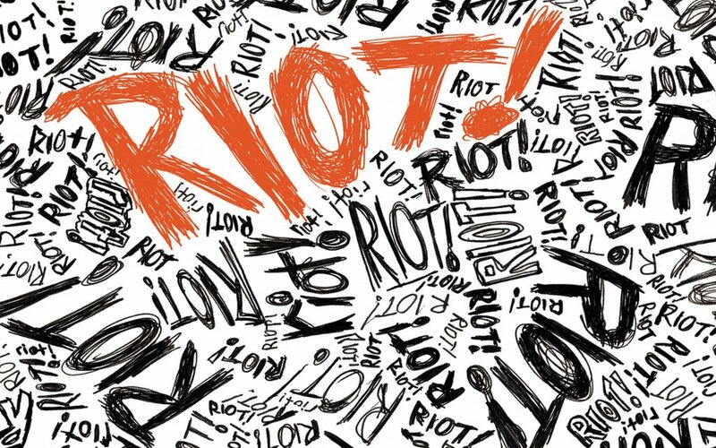 graffiti art with the word riot