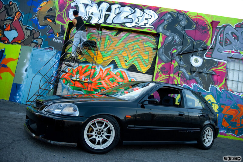 graffiti artist painting car