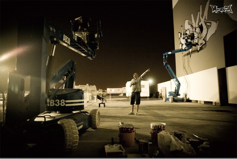 Graffiti artists at night