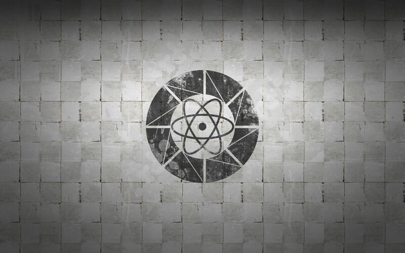 graffiti atom symbol on wall