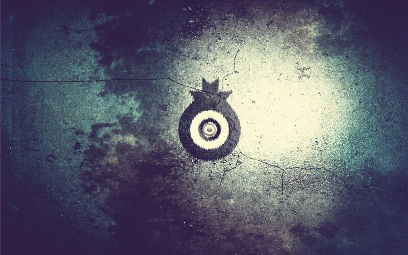 graffiti bomb symbol on wall