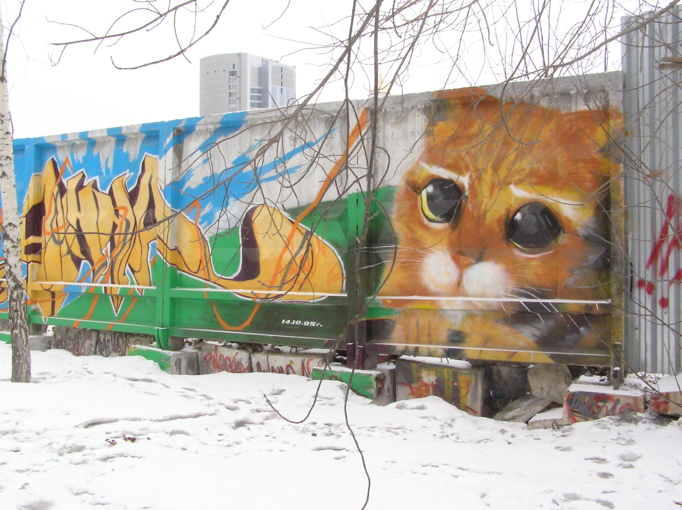 graffiti cat mural in snow