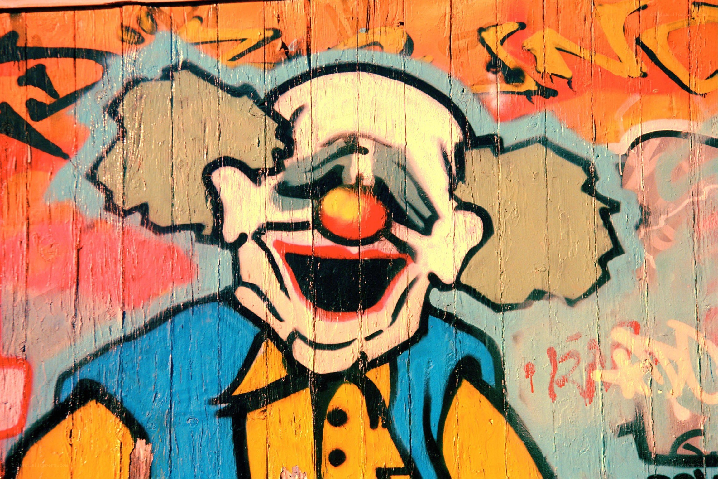 graffiti clown on wood