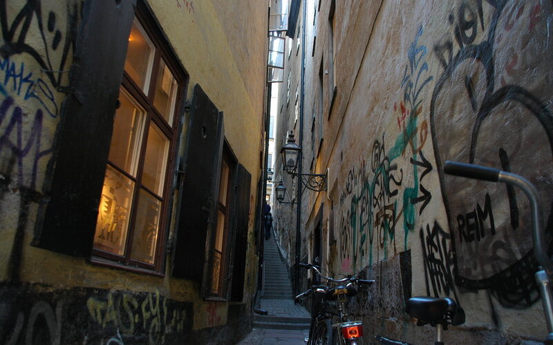 graffiti-covered alley in old town