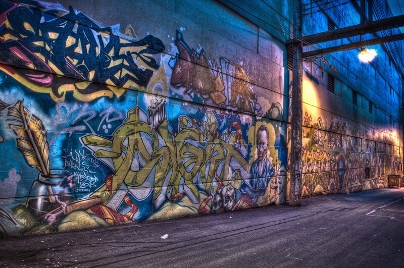 Graffiti-covered Alley Wall — Blue