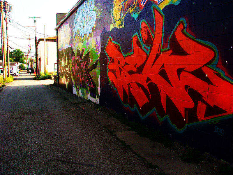 graffiti-covered alleyway