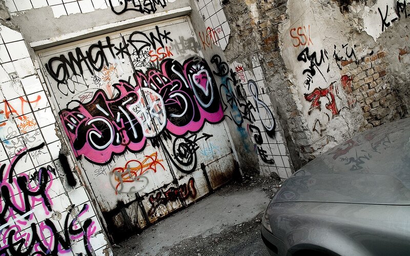 graffiti-covered alleyway