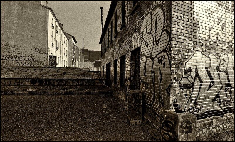 graffiti-covered alleyway