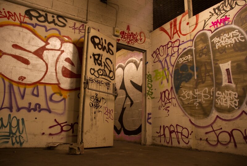 graffiti-covered alleyway