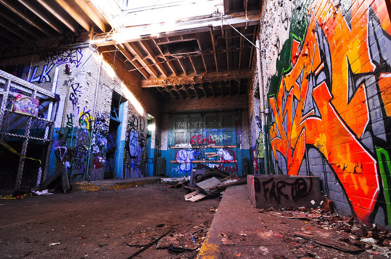 graffiti-covered alleyway