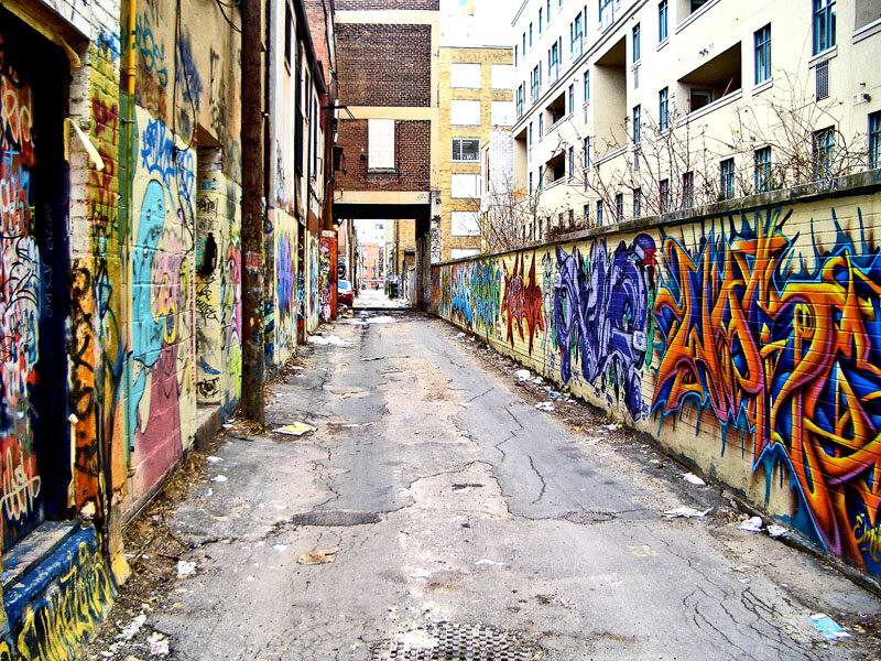 graffiti-covered alleyway