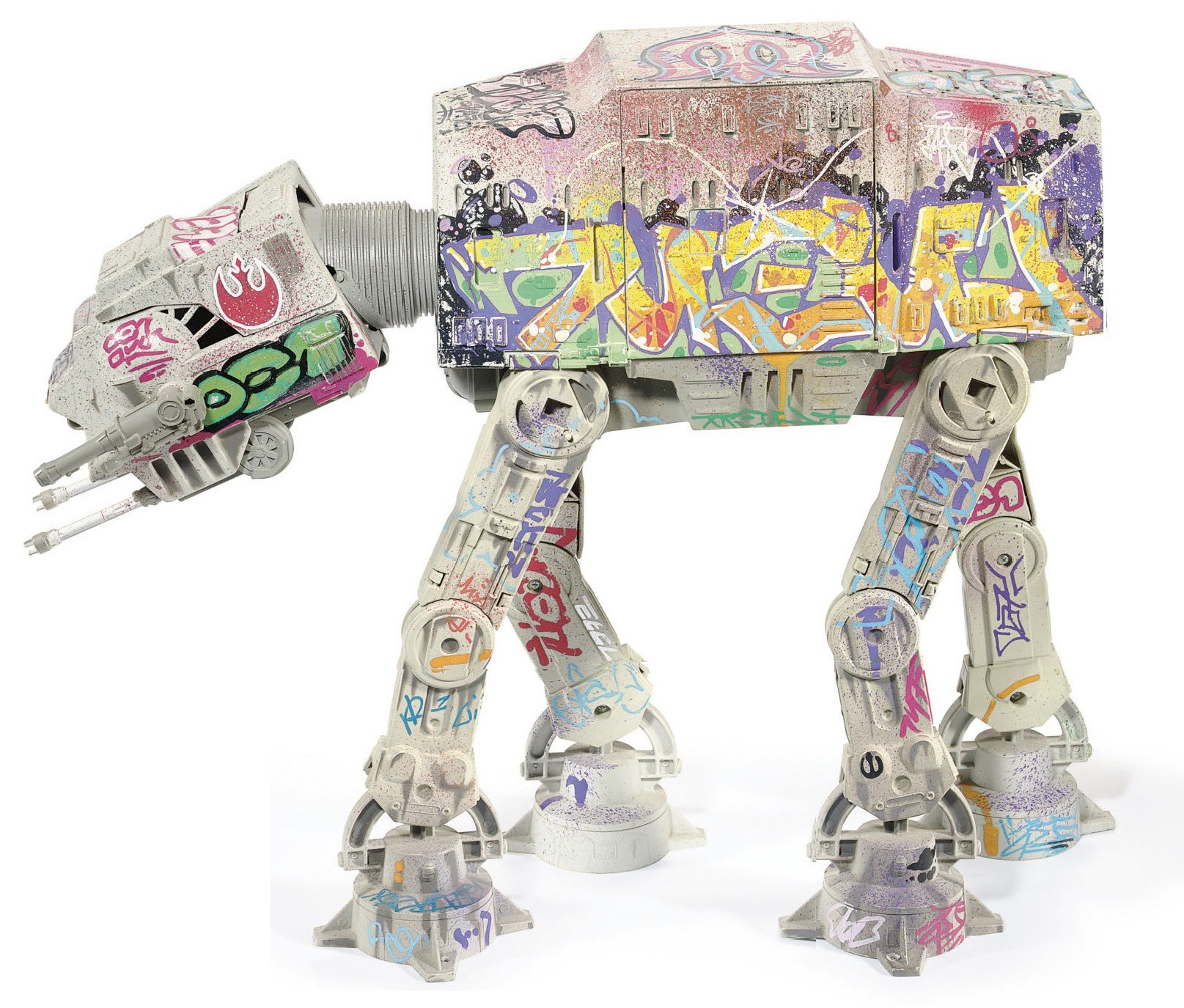 graffiti-covered at-at toy