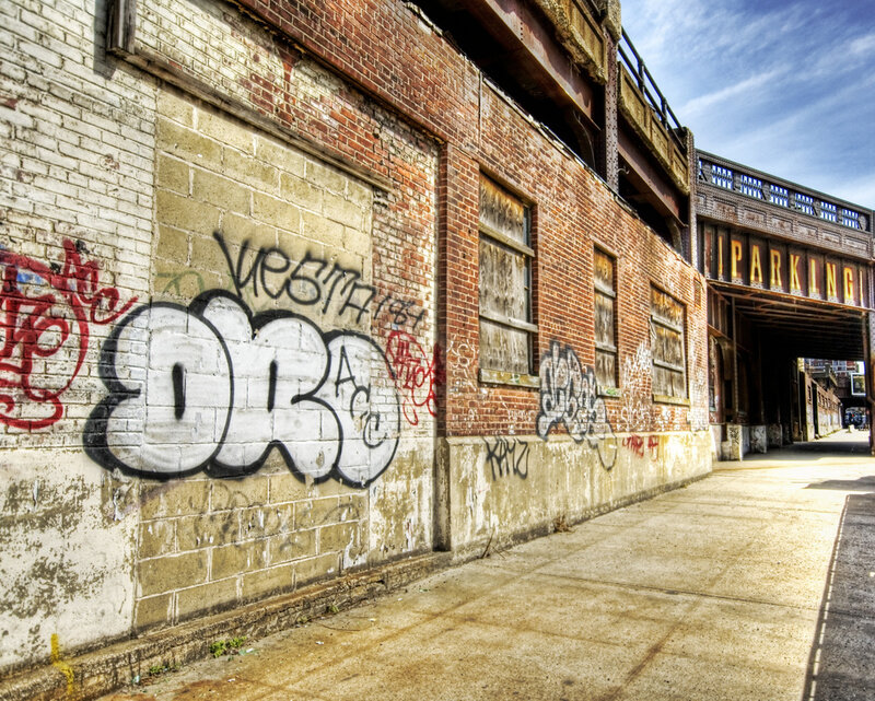Graffiti-covered brick building
