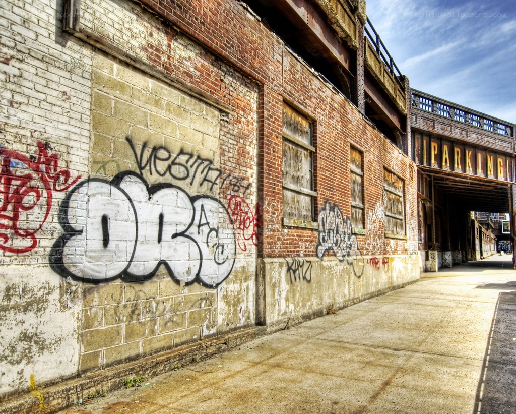 Graffiti-covered brick building