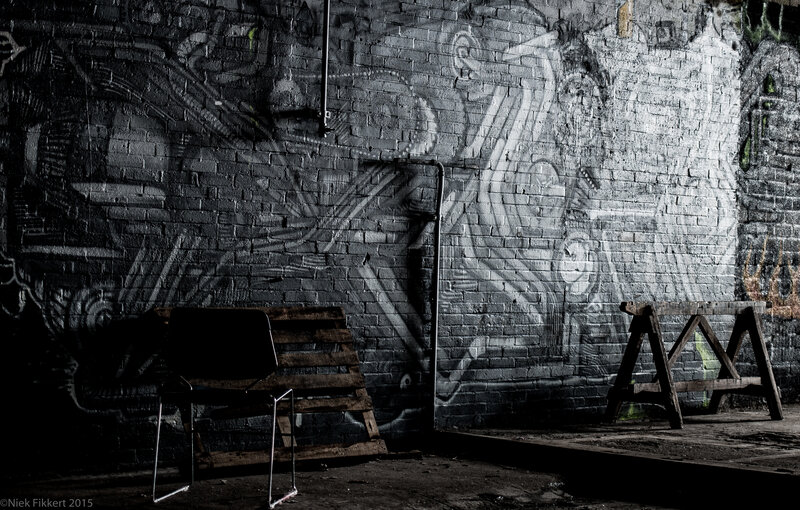 Graffiti-covered Brick Wall — Black