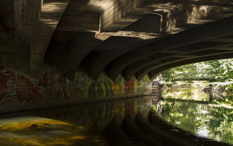 Graffiti-covered Bridge Underpass — Green