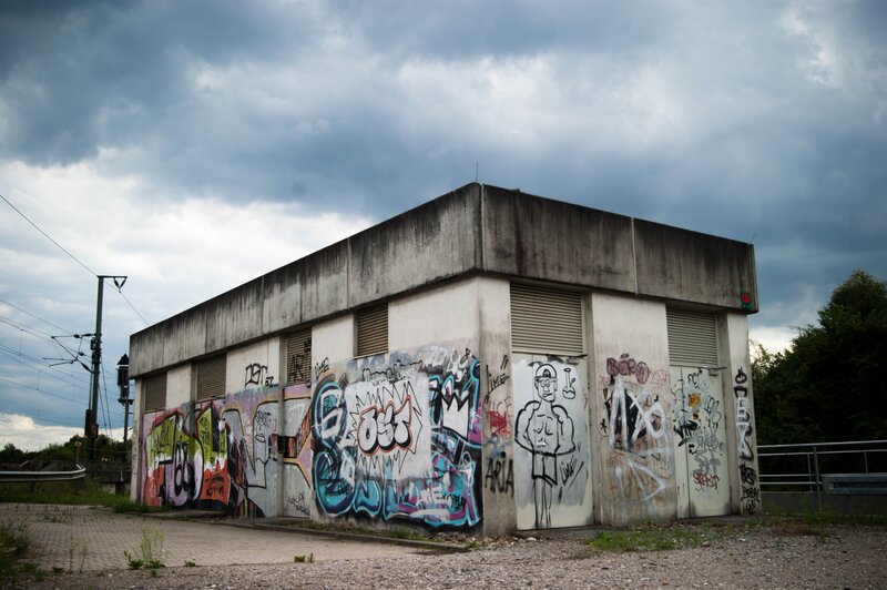 Graffiti-covered Building — Gray, Dramatic