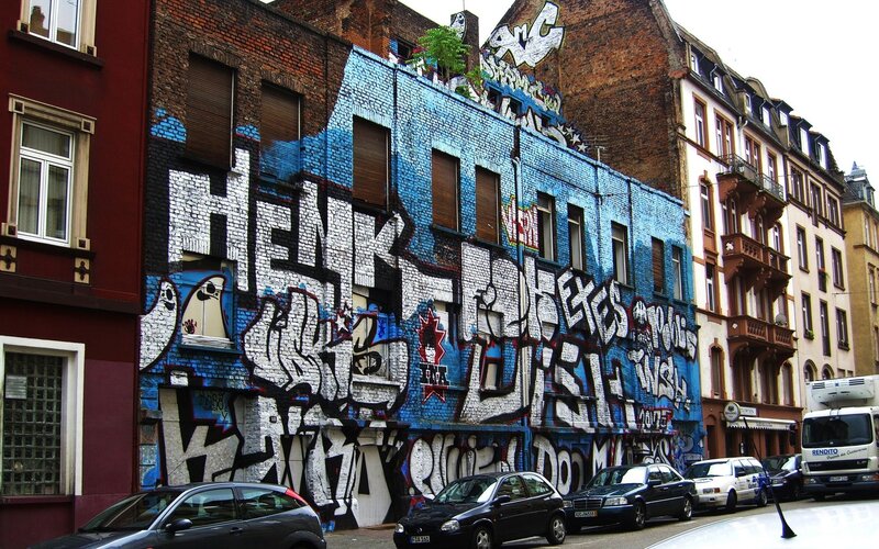 Graffiti-covered building in city