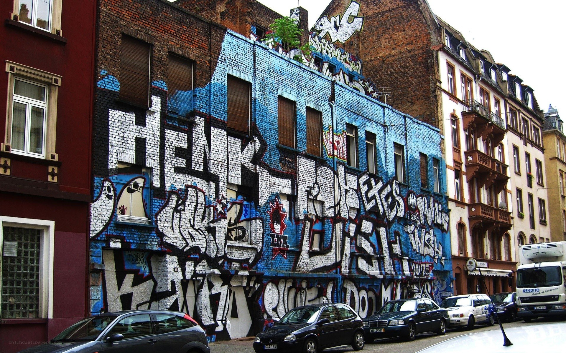 Graffiti-covered building in city
