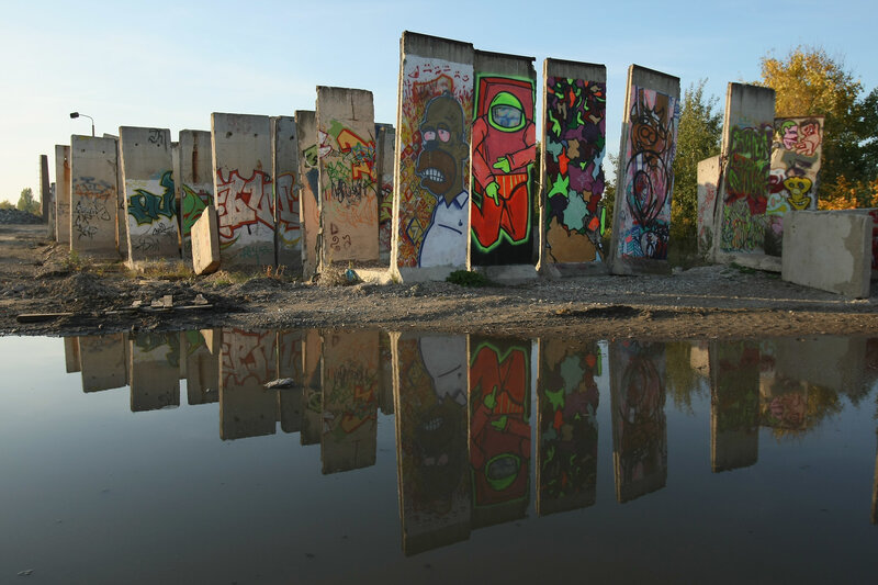 Graffiti-covered concrete barriers