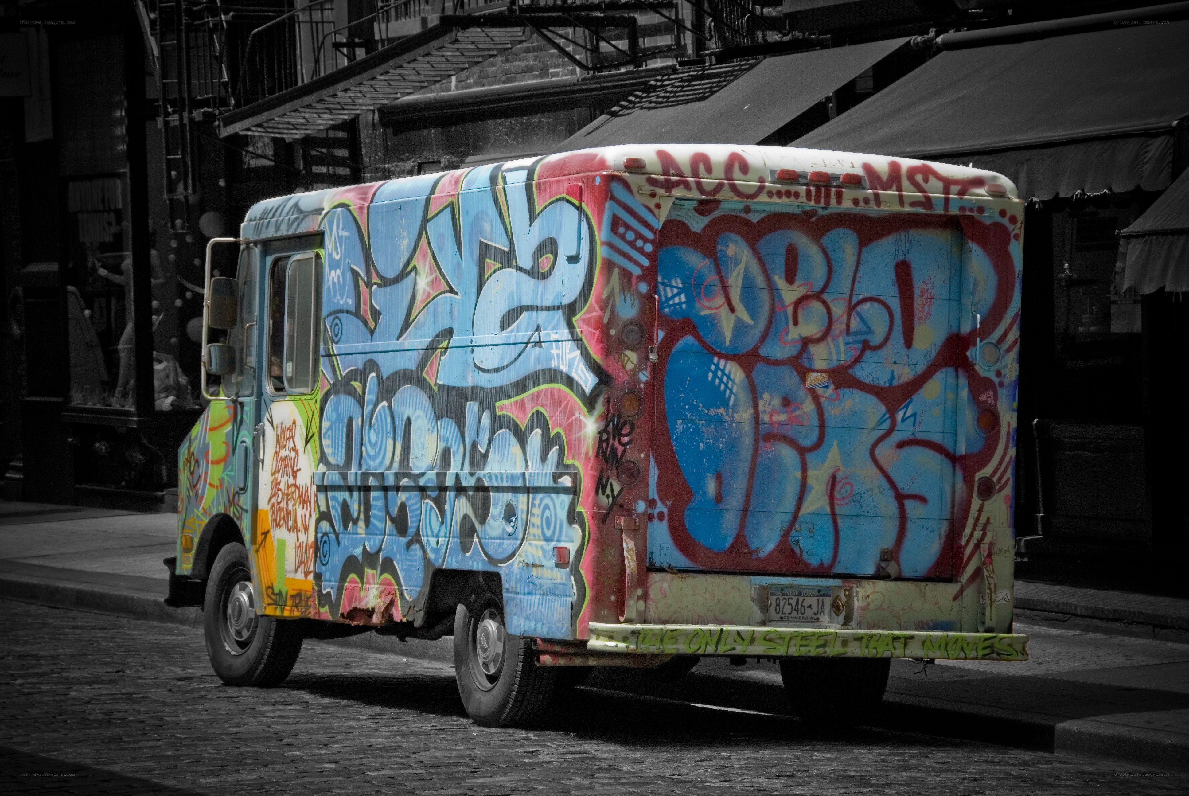 graffiti-covered delivery truck