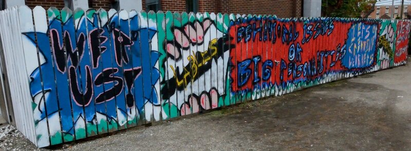 Graffiti-covered Fence