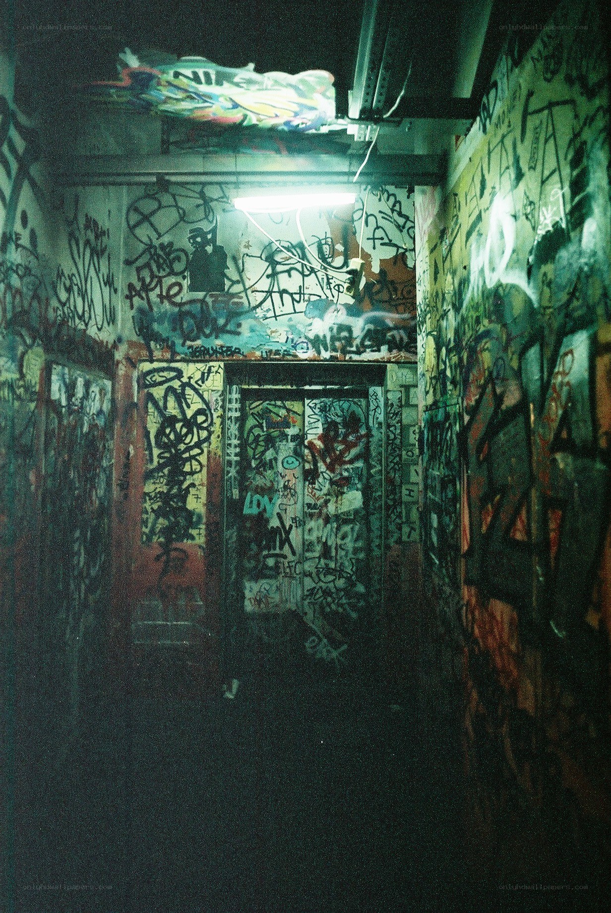 graffiti-covered hallway