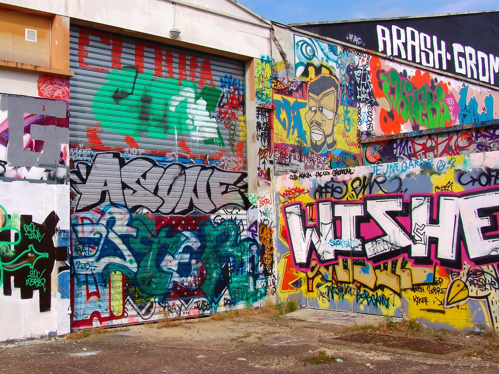 graffiti-covered industrial building